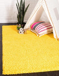 Unique Loom Solid Shag Collection Area Rug (7' 10" x 10' Rectangle, Tuscan Sun Yellow)