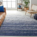 SAFAVIEH Adirondack Collection Area Rug - 6'7" Square, Navy & Ivory, Modern Ombre Design, Non Shedding & Easy to Clean, Ideal for Living Room, Bedroom, Office, Dining Space (ADR113N)