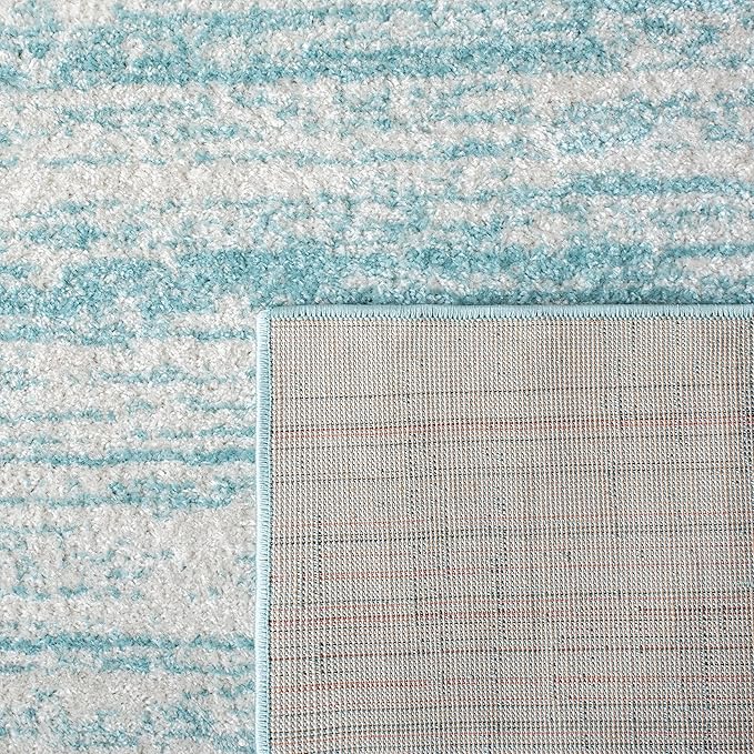 SAFAVIEH Adirondack Collection Area Rug - 5'5" x 7'7", Aqua & Ivory, Modern Ombre Design, Non Shedding & Easy to Clean, Ideal for Living Room, Bedroom, Office, Dining Space (ADR113J)
