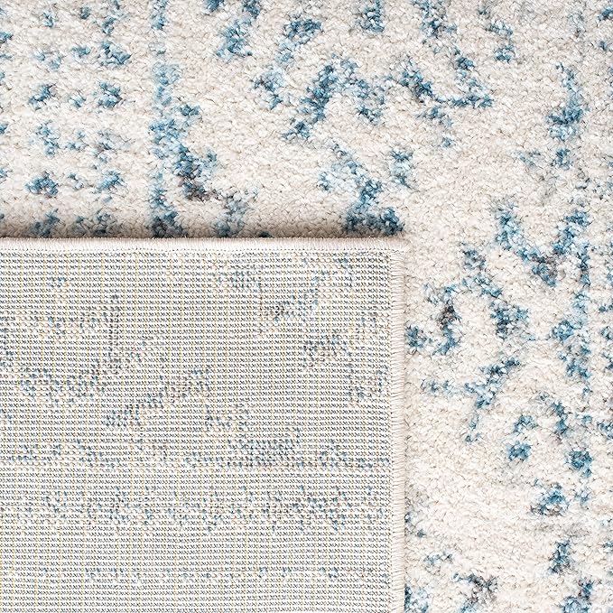 SAFAVIEH Tulum Collection Area Rug - 5'3" x 7'6", Ivory & Turquoise, Moroccan Boho Tribal Design, Non-Shedding & Easy to Clean, Ideal for Living Room, Bedroom, Dining Space (TUL272E)