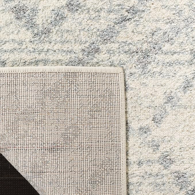 SAFAVIEH Adirondack Collection Area Rug - 6' x 9', Ivory & Light Blue, Modern Diamond Distressed Design, Non-Shedding & Easy Care, Ideal for High Traffic Areas in Living Room, Bedroom (ADR131T)