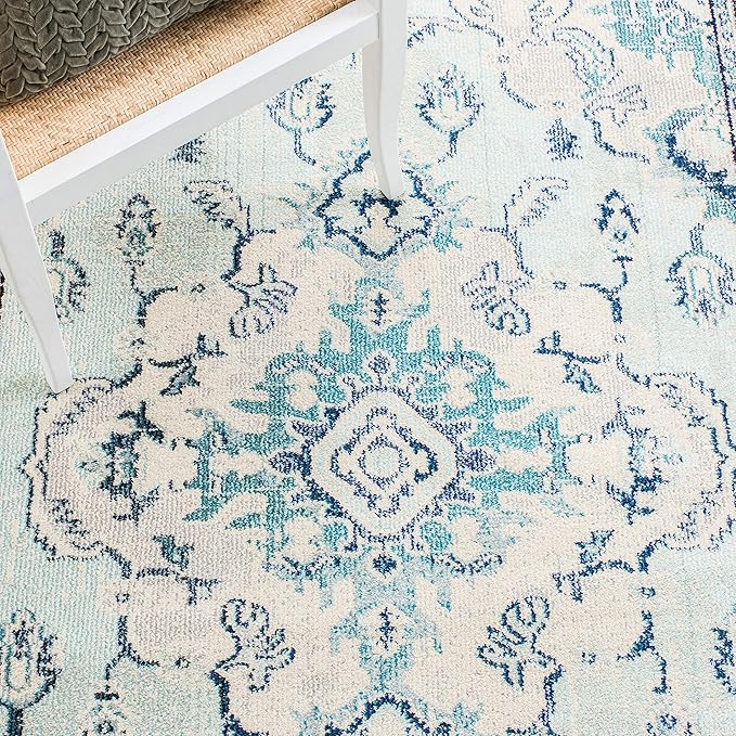 SAFAVIEH Monaco Collection Area Rug - 6'7" x 9'2", Light Blue & Ivory, Boho Chic Medallion Distressed Design, Non-Shedding & Easy Care, Ideal for High Traffic Areas in Living Room, Bedroom (MNC243K)
