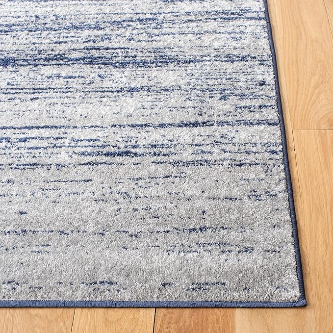 SAFAVIEH Area Rug 6x9 - Adirondack Collection - Navy & Grey, Modern Ombre Design, Non Shedding & Easy to Clean, Ideal for Living Room, Bedroom, Office, Dining Space (ADR113E)